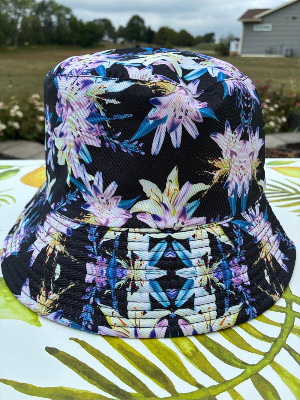 Source Unknown Black Floral Bucket Hat with Purple and Blue Lilies